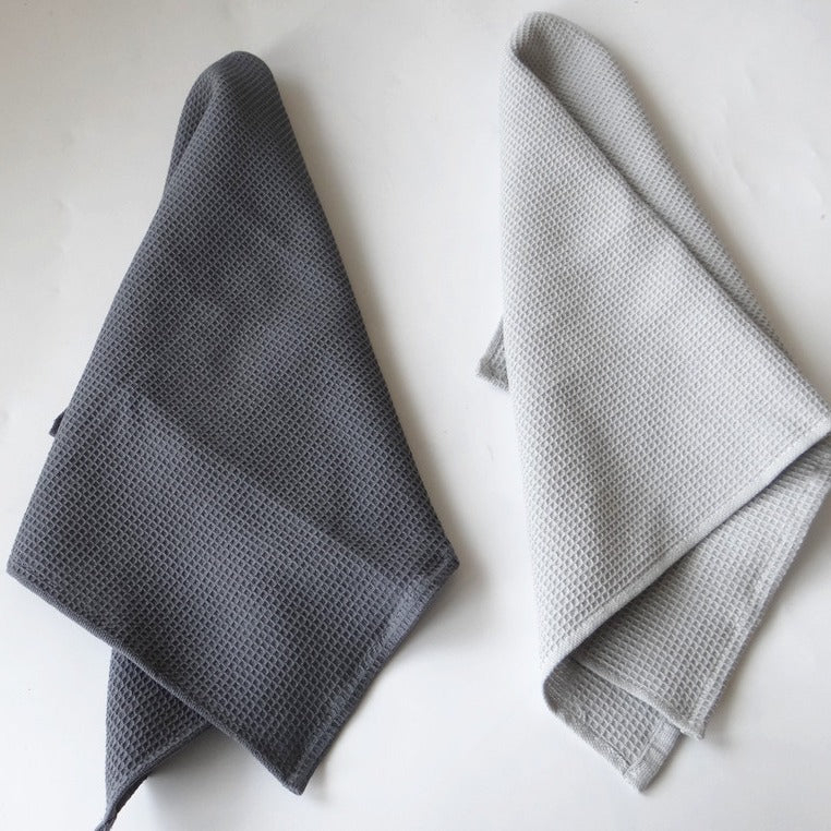 Cotton waffle weave kitchen tea towel, folded