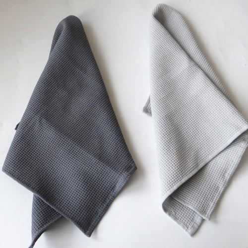 Cotton waffle weave kitchen tea towel, folded