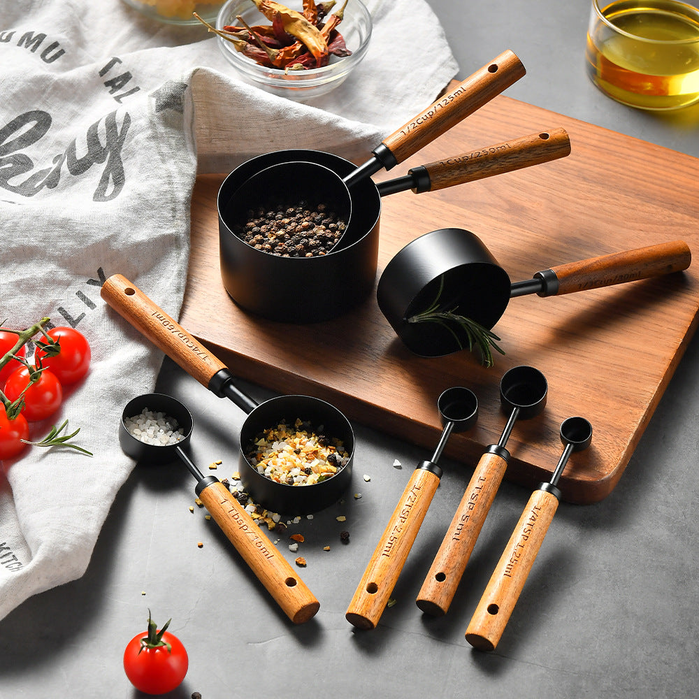 Stainless steel measuring cups and spoons set with wooden handles